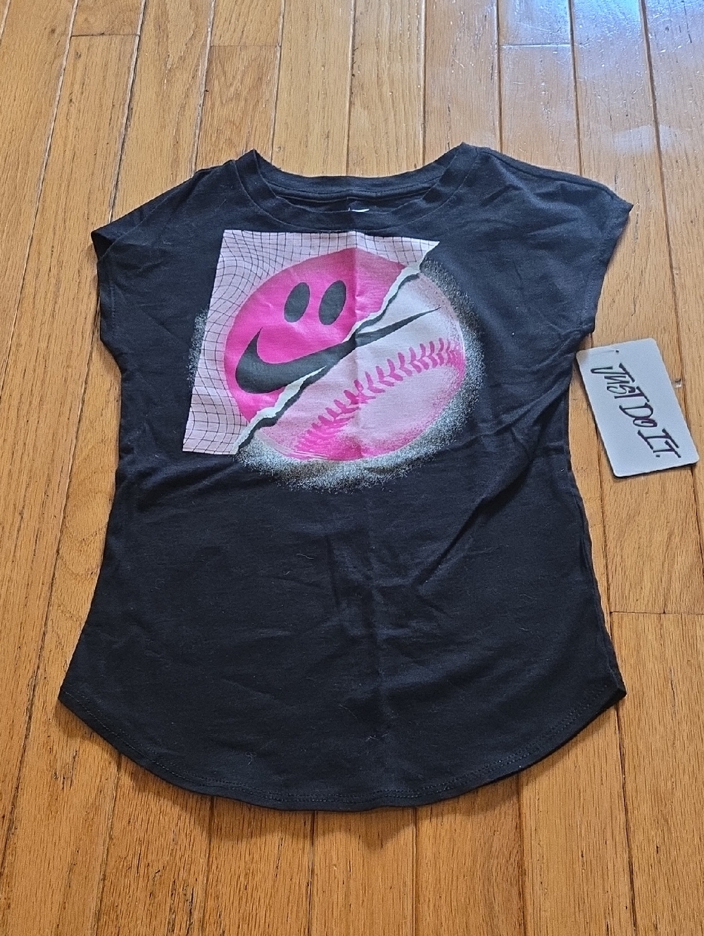 Nike Black Short-Sleeve Kids Tee with Pink Smiley Baseball Graphic